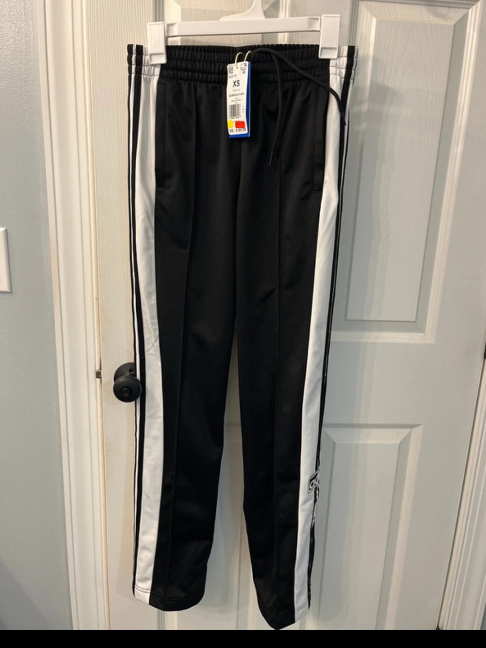 Woman’s adidas track pants